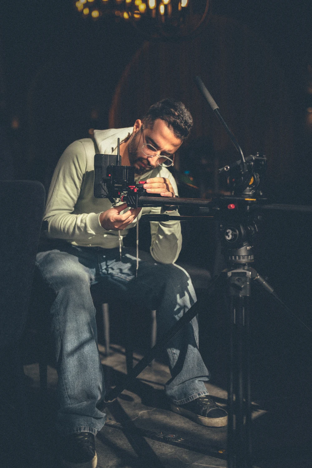 Ali working with the camera on a production set